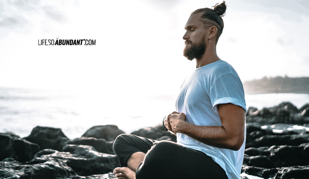 LSA - Young Man Resting at Coastline Rock - Life So Abundant® LifeSoAbundant.com