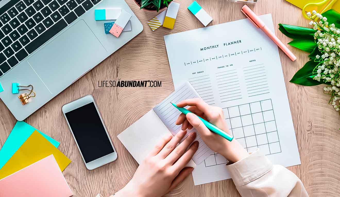 Goal Setting - Cropped View of Woman Sitting Around a Desk Goal Setting - Life So Abundant®